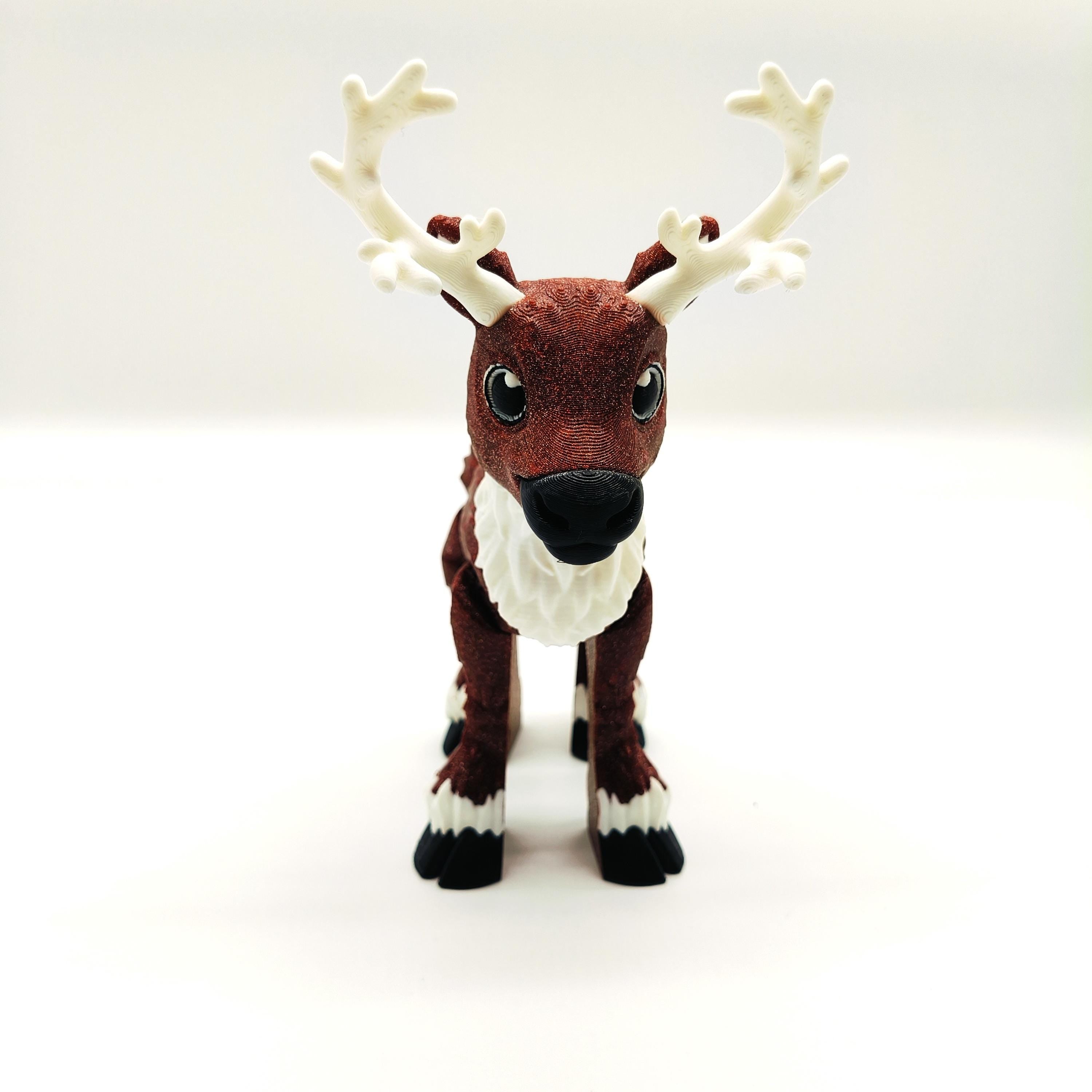 Delightful Articulated Reindeer Figurine Featuring Festive Glitter Finish, Intricate Antlers, and Whimsical Design Perfect for Holiday Decor